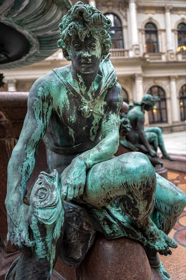 Figures at the Hygieia Fountain in the courtyard of the City Hall