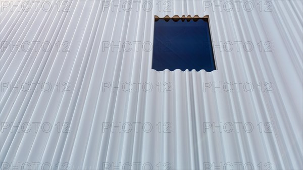 Modern facade made of corrugated acrylic glass