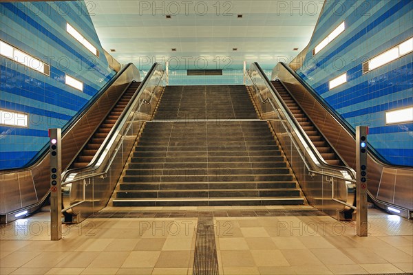 Stairs and two escalators