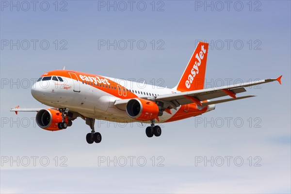 An EasyJet Europe Airbus A319 with registration OE-LQX lands at the airport in Barcelona