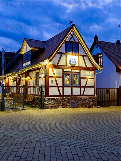 Old half-timbered house at dusk