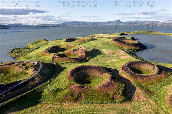 Aerial view of green volcanic crater