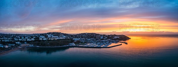 Panorama over Torquay and Torquay Marina from a drone in sunrise time