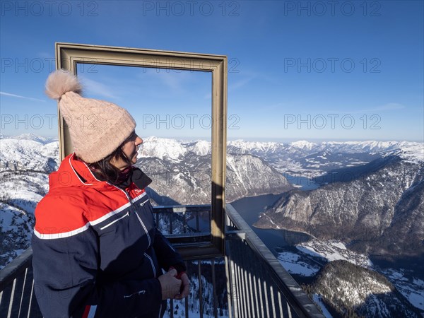 Tourist admires winter landscape at Five Fingers viewpoint