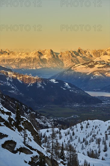 View from Mount Kitzsteinhorn on snow covered mountains down to Zell am See