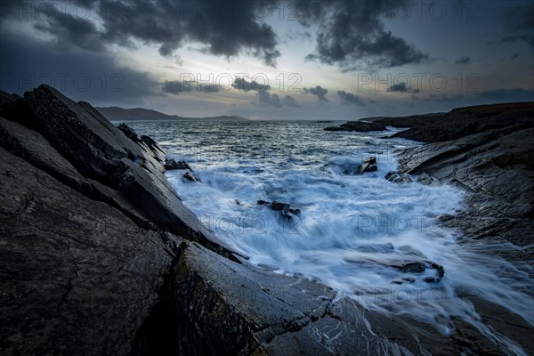 Sea surf on rocky coast