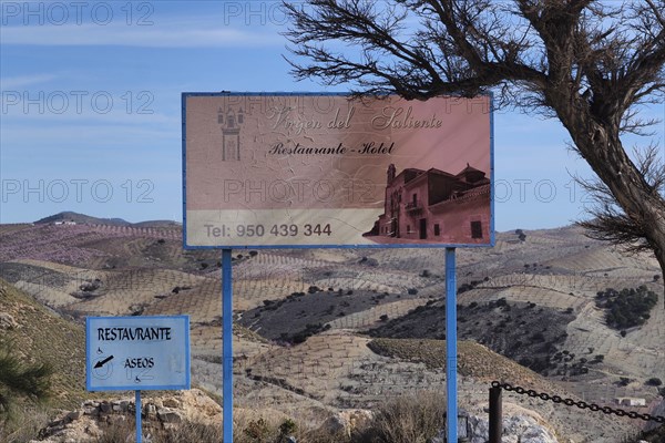 Signage for restaurant at Virgin de Saliente monastery