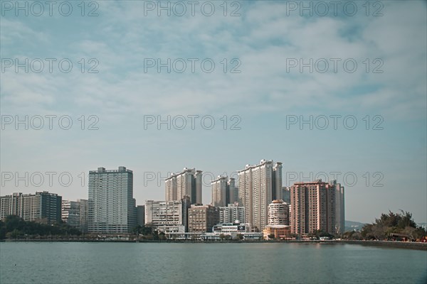 Tall buildings by water in Macau