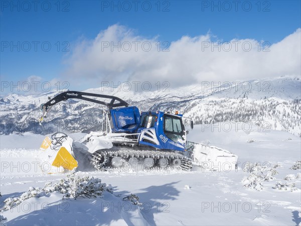 Snow groomer or Pistenbully levels ski slope