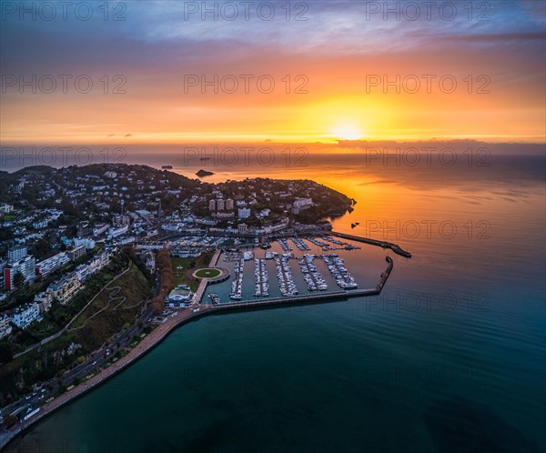 Panorama over Torquay and Torquay Marina from a drone in sunrise time