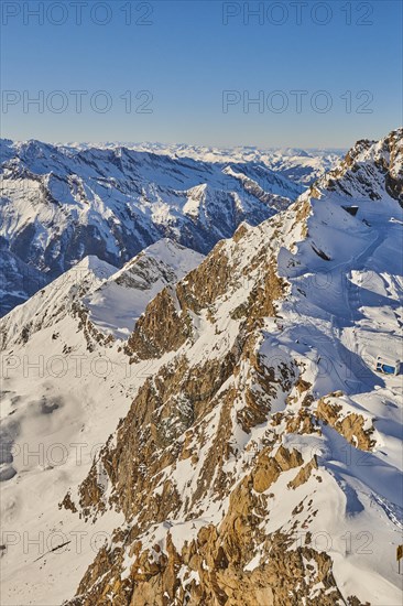 View from Mount Kitzsteinhorn on snow covered mountains