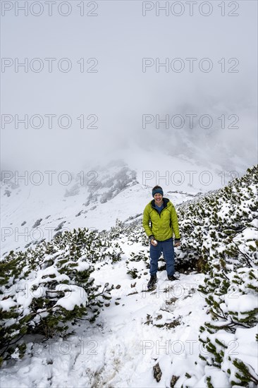 Hikers on a hiking trail in the snow