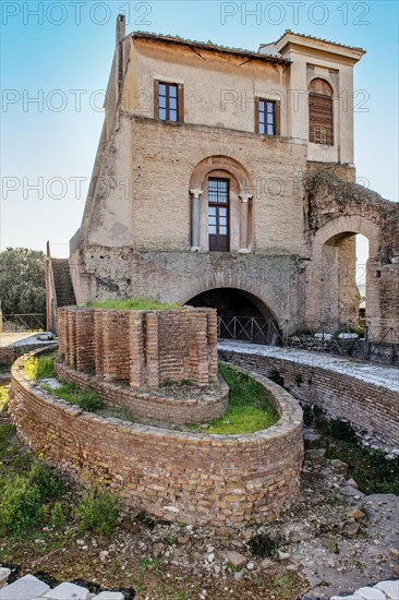 Ruins of ancient oval nymphaeum in former imperial palace Domus Augustana