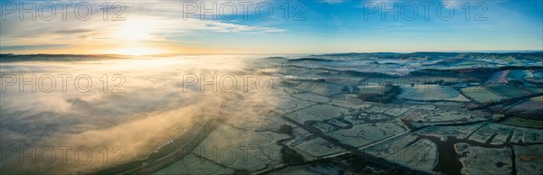 Sunrise panorama over RSPB Exminster and Powderham Marshes and River Exe