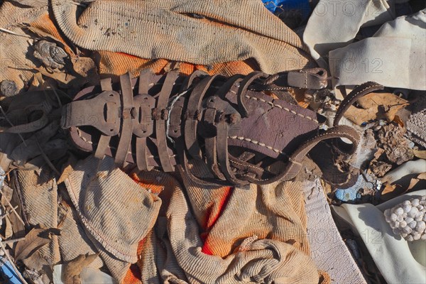 Fragment of leather sandal