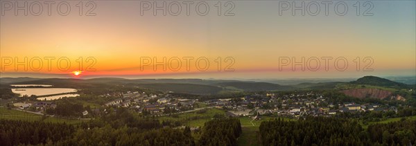Panorama aerial view of the health resort Altenberg in the district of Saechsische Schweiz-Osterzgebirge at sunset