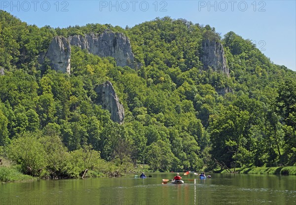 Kayakers paddling on the Danube between Hausen im Tal and Gutenstein