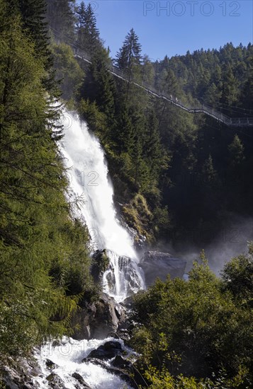 Hiking trail over a suspension bridge along the Stuibenfall near Umhausen