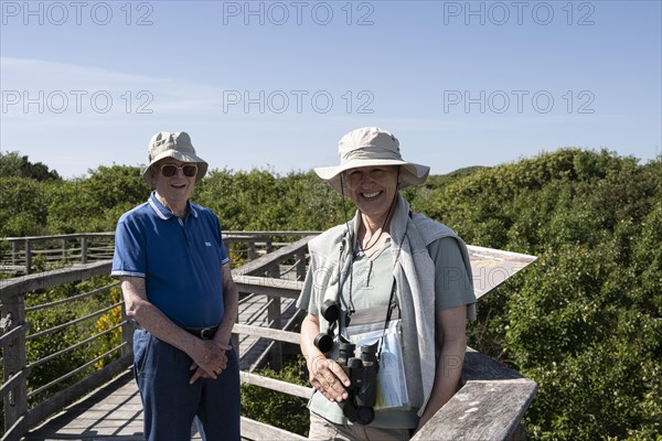 Two tourists at the nature trail