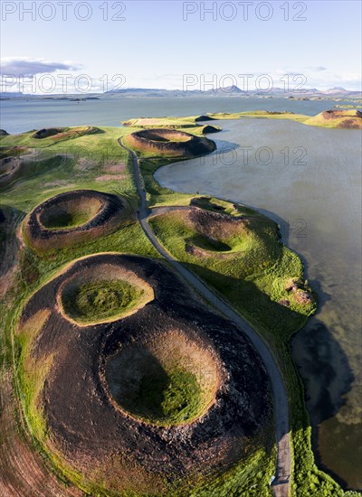 Aerial view of green volcanic crater