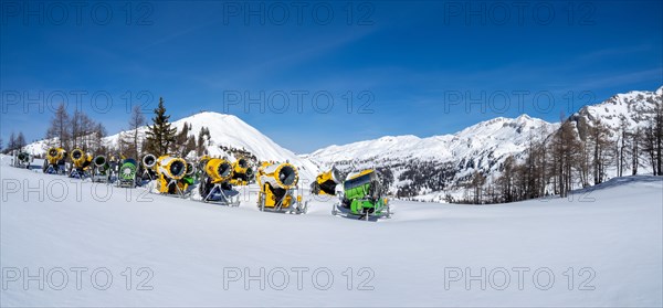 Snow cannons on a ski slope