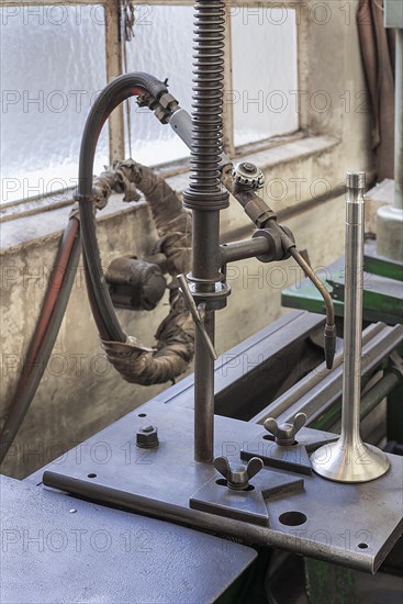 Valve welding machine in a former valve factory