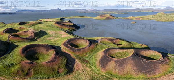 Aerial view of green volcanic crater