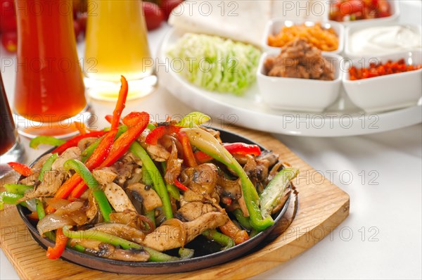 Original fajita sizzling smoking hot served on iron plate