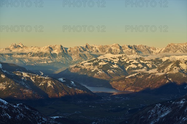 View from Mount Kitzsteinhorn on snow covered mountains down to Zell am See