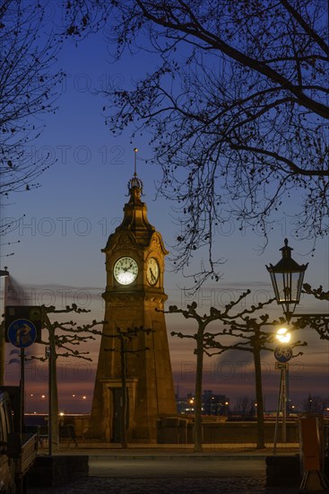 Duesseldorf Rhine bank promenade with water level clock