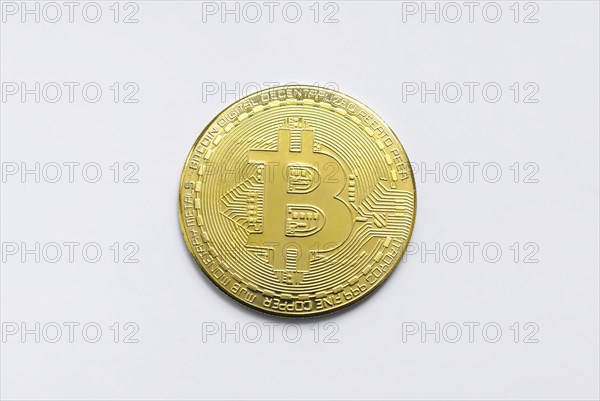 Bitcoin BTC crypto currency gold coins on white background