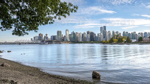 View across the sea from Hallelujah Point to skyline with skyscrapers