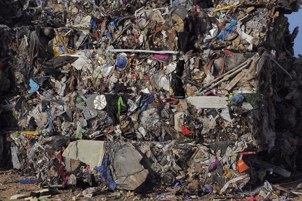 Crushed metal stacked in cubes