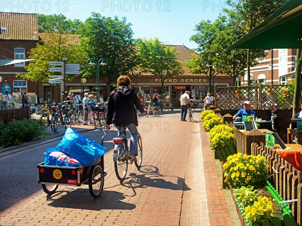 Bicycle with trailer in the centre of Langeoog