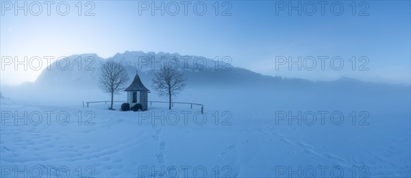 Chapel in front of Grimming in the morning mist