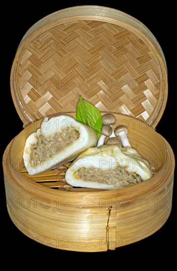 Halved bhan bao stuffed with pork meat and shimeji mushrooms