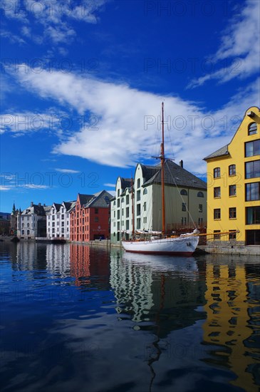 House front reflected in the water