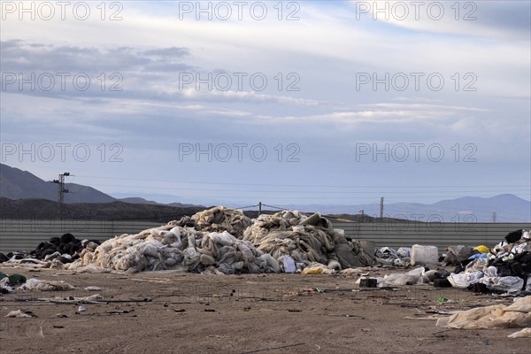 Waste plastic tarpaulins at scrap yard