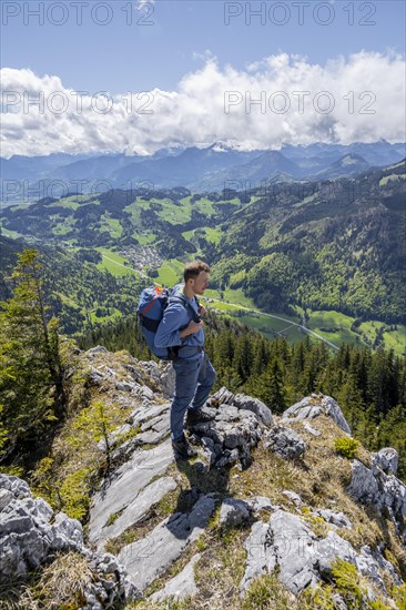 Hiker standing on a rock