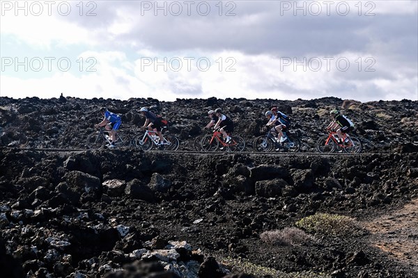 Road cyclist on the coastal road near Orzola