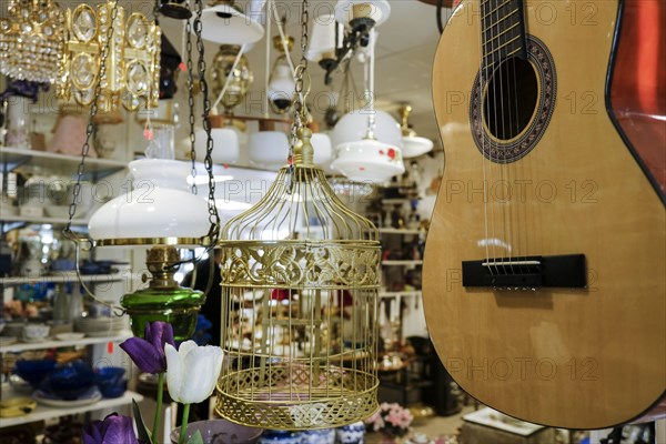 Guitar and miscellaneous for sale at a flea market