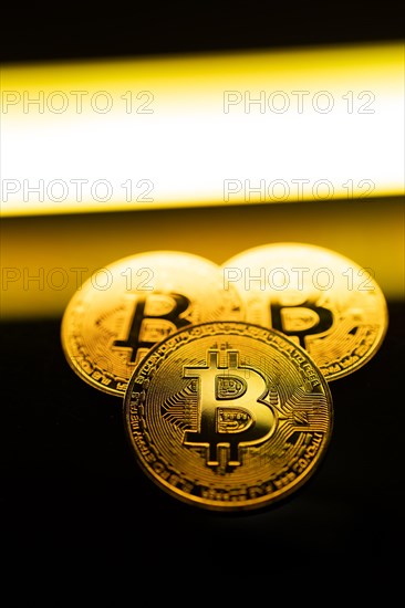 Bitcoins are golden coins and a new cryptocurrency