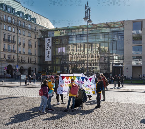 Children demonstrate for more respect in front of the Brandenburg Gate