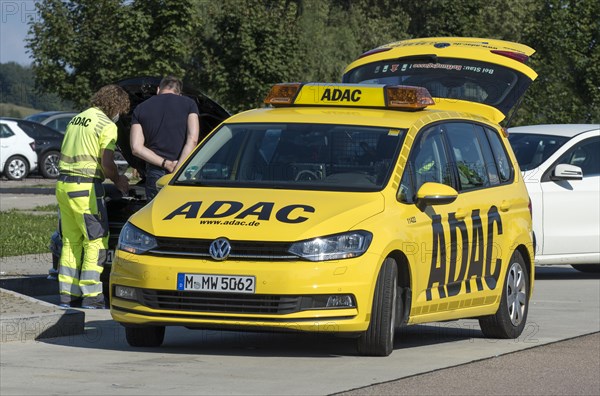 ADAC breakdown service checks defective car at motorway service area on A8 motorway