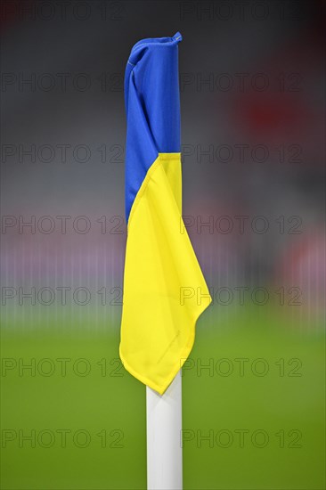 Corner flag in Ukrainian national colours as a symbol against the war Russia vs. Ukraine