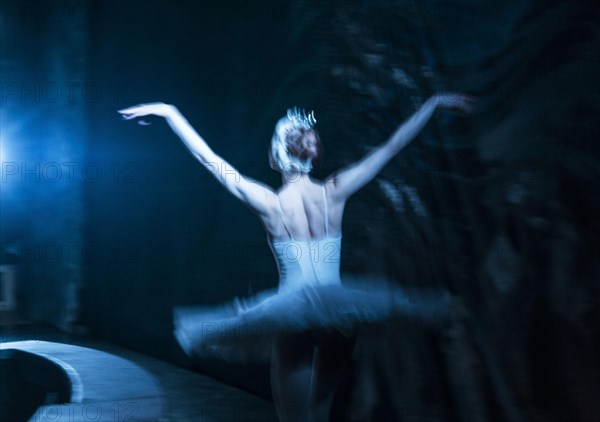 The principal Ballet dancer flying on stage during the performance of Tchaikovskys Swan Lake in St. Petersburg