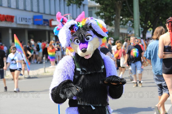 Colourful bear at Christopher Street Parade 2021 posing for the camera