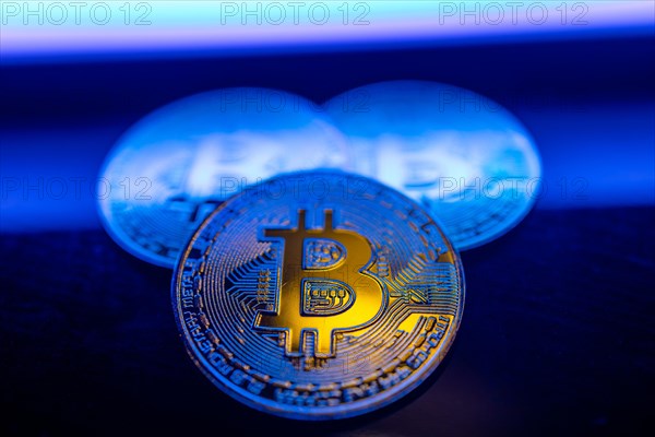 Bitcoins are golden coins and a new cryptocurrency