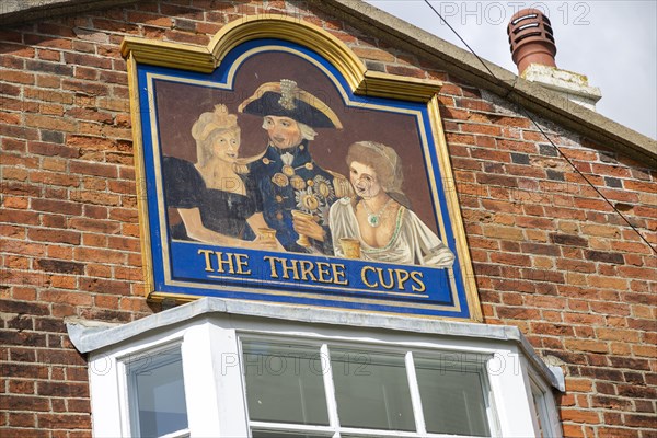 The Three Cups historic pub sign with Lord Nelson