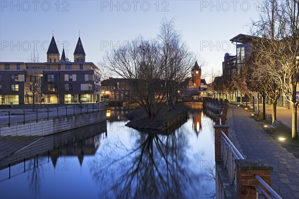 St. Anthony's Parish Church and Old Town Hall Tower with the River Dinkel in the Evening